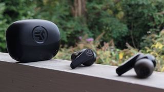 The JLab Go Pods ANC on a window sill.