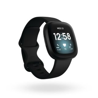 Fitbit versa watch in black on a white background