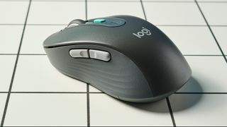 A black Logitech Signature AI Edition M750 wireless mouse