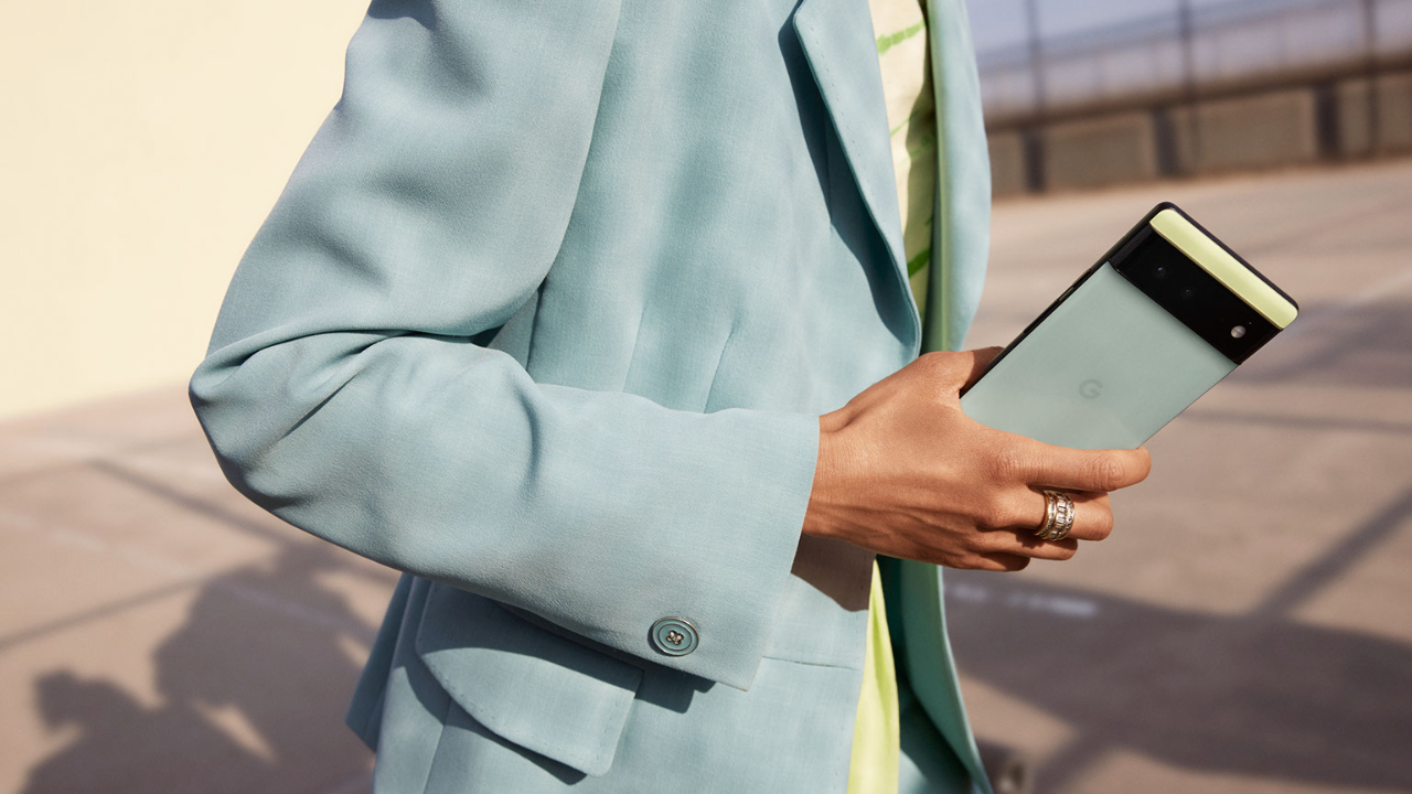 Google Pixel 6 Android phone being held by an human male