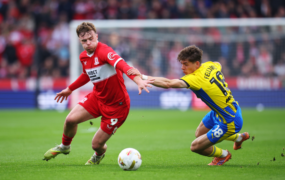 Tommy Conway of Middlesbrough is challenged by Tom Fellows of Southampton during the Sky Bet Championship Play Off Semi Final Second Leg match between Middlesbrough and Southampton at Riverside 
