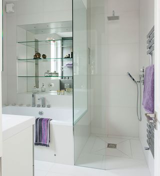 white bathroom with side by side bath and walk in shower