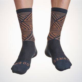 Male cyclist wearing the PNW Air cycling socks