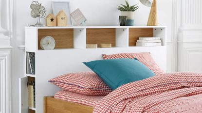 La Redoute Biface Storage Headboard in white decorated with things with bed made using red covers