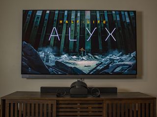 Half Life: Alyx on TV with Oculus Quest headset sitting below it