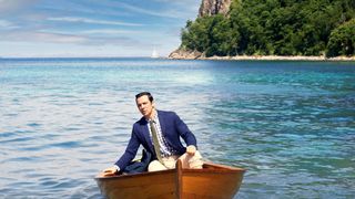 Death in Paradise Ralf Little in a boat