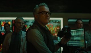 Godzilla: King of the Monsters Rick manning his station and looking at something impressive