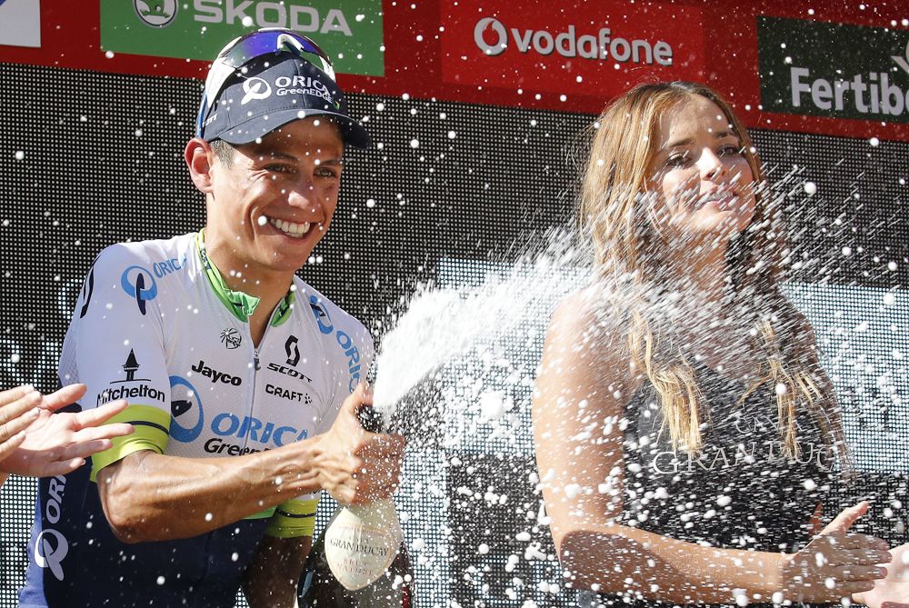 Estaban Chaves celebrates on the satge 6 podium at the Vuelta a Espana.