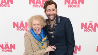 David Tennant and Catherine Tate laughing together at a special screening of The Nan Movie on March 15, 2022.