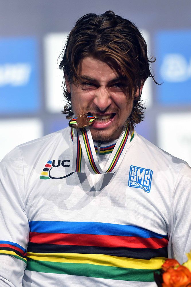 Peter Sagan (Slovakia) taking a bite of his gold medal