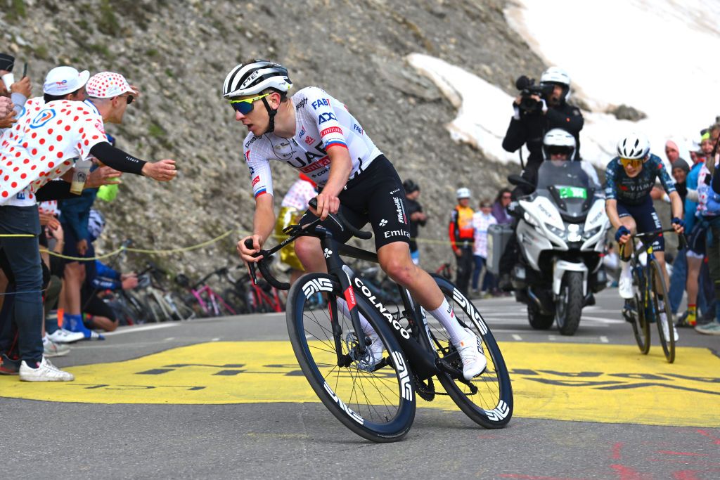 VALLOIRE FRANCE JULY 02 LR Tadej Pogacar of Slovenia and UAE Team Emirates attacks to Jonas Vingegaard Hansen of Denmark and Team Visma Lease a Bike climbing to the Col du Galibier 2642m during the 111th Tour de France 2024 Stage 4 a 1394km stage from Pinerolo to Valloire UCIWT on July 02 2024 in Valloire France Photo by Dario BelingheriGetty Images