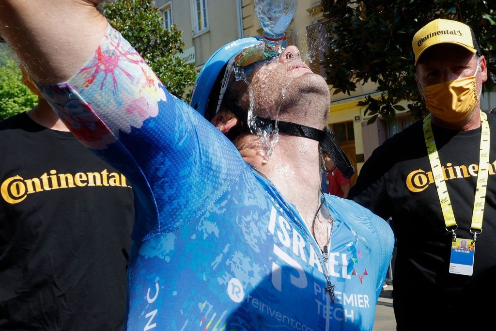 IsraelPremier Tech teams Canadian rider Hugo Houle cools himself down after winning the 16th stage of the 109th edition of the Tour de France cycling race 1785 km between Carcassonne and Foix in southern France on July 19 2022 Photo by GONZALO FUENTES POOL AFP Photo by GONZALO FUENTESPOOLAFP via Getty Images