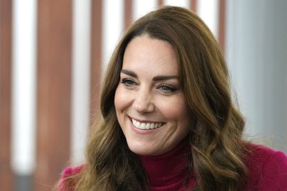 Kate Middleton, Duchess of Cambridge smiles during a visit to Nower Hill High School on November 24, 2021 in London, England