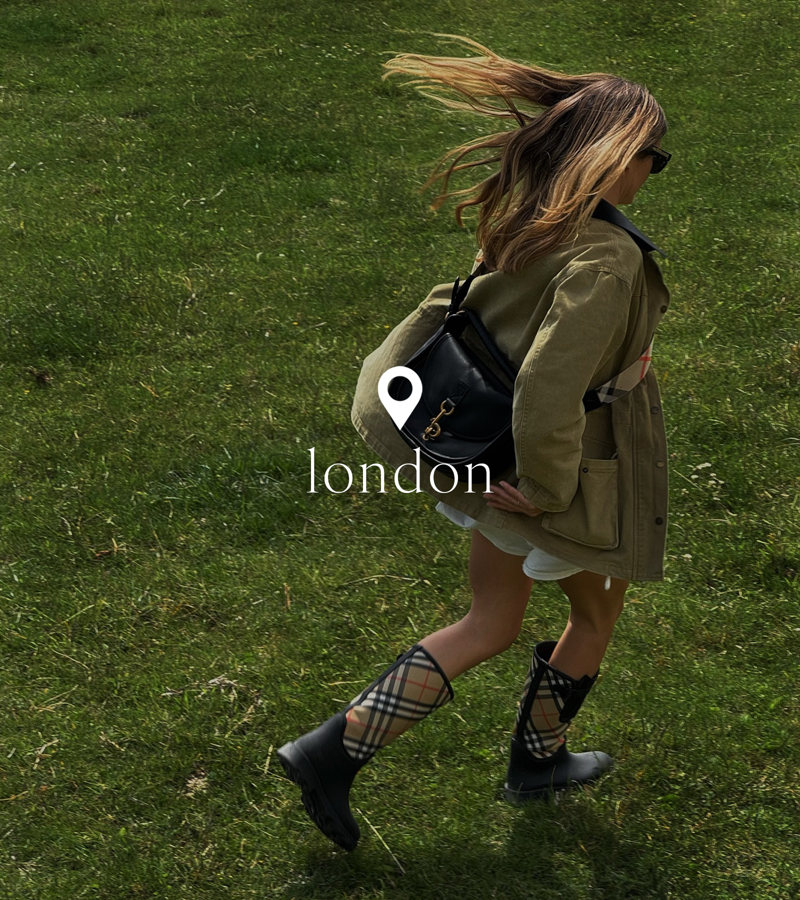 Woman in London wearing a barn jacket.