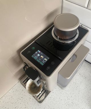 An overhead shot of the De'Longhi Rivelia coffee maker while making a long black coffee