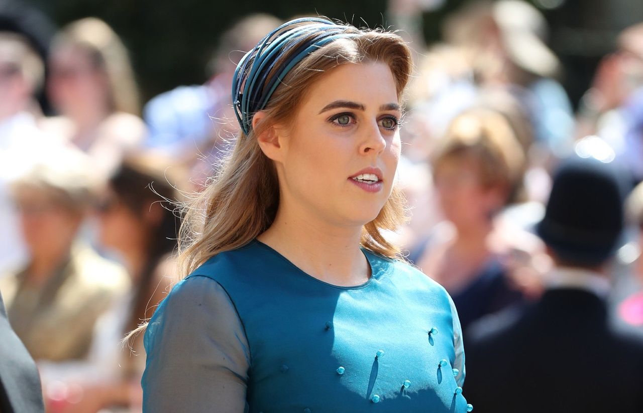 Princess Beatrice arrives at St George&#039;s Chapel at Windsor Castle before the wedding of Prince Harry to Meghan Markle