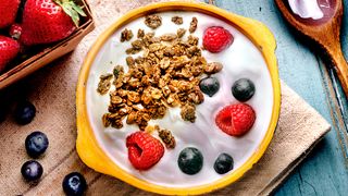 A bowl of yogurt, berries and oats