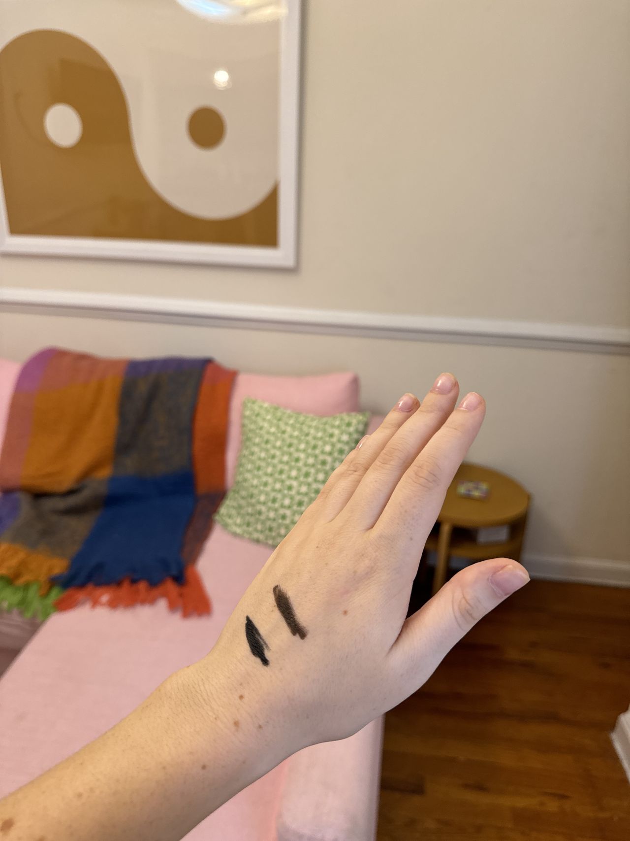 MAC Colour Excess Gel Liner brown and black swatches on back of hand