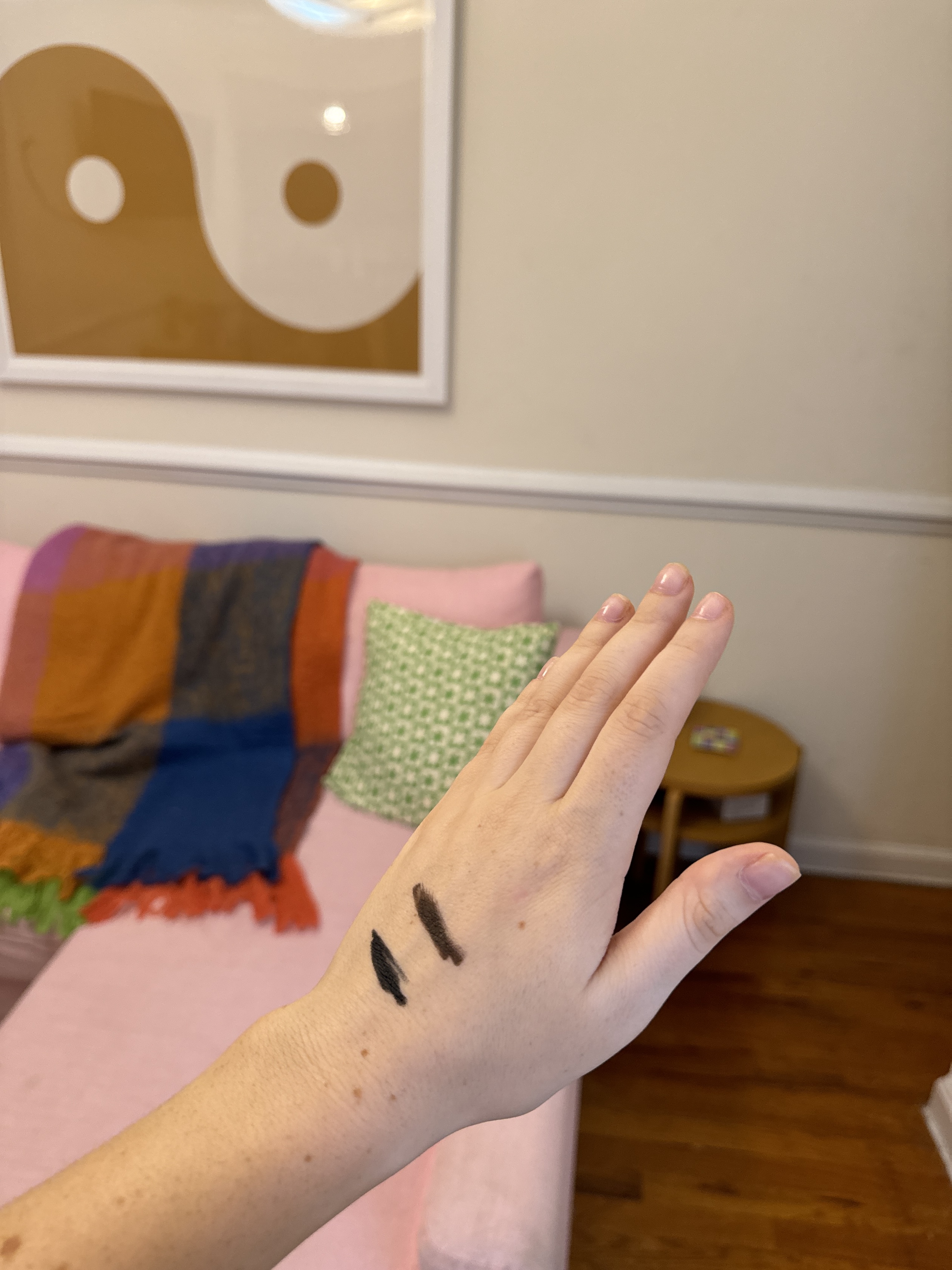 MAC Colour Excess Gel Liner brown and black swatches on back of hand
