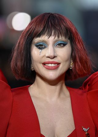 Lady Gaga on the Joker Folie a Deux red carpet wearing a celine gown with method makeup and hair