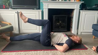 Fit&Well fitness writer performing a dead bug