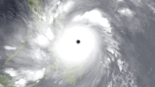 This image shows some of the islands at the mouth of the Leyte Gulf in the Philippines through the eye of Super Typhoon Haiyan.