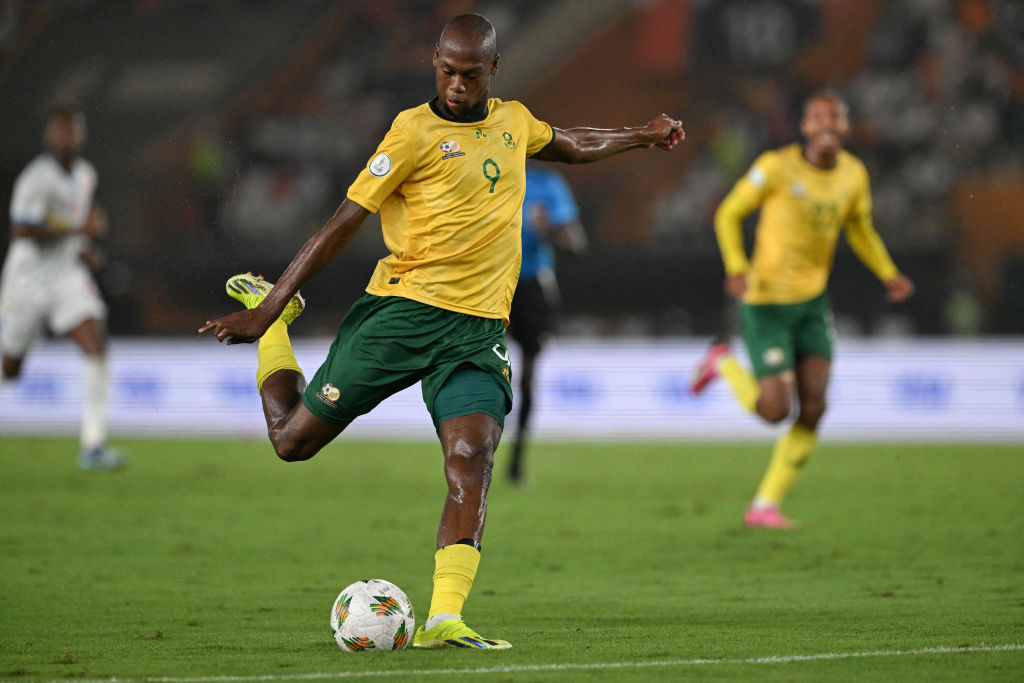 South Africa&#039;s forward #9 Evidence Makgopa kicks the ball during the Africa Cup of Nations (CAN) 2024 third place play-off football match between South Africa and Democratic Republic of Congo at Felix Houphouet-Boigny Stadium in Abidjan on February 10, 2024. (Photo by SIA KAMBOU / AFP)