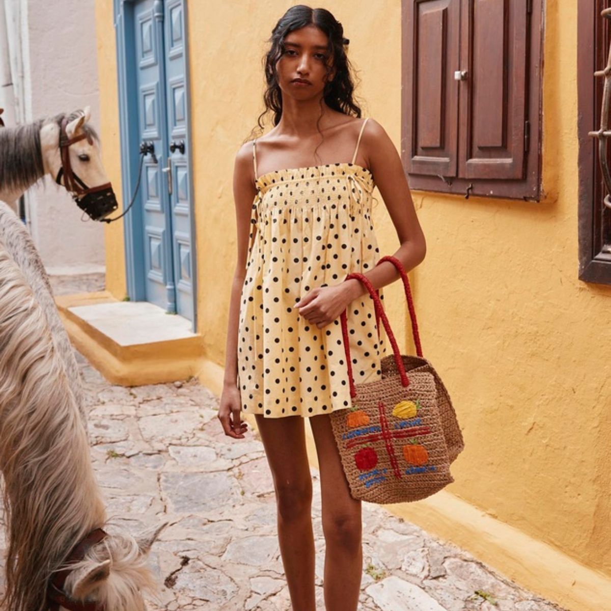 woman wearing polka dot dress