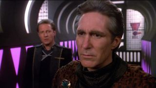 Bruce Boxleitner looks puzzled at Michael O'Hare in Babylon 5.