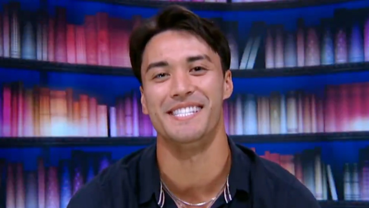 A Houseguest smiling in Big Brother