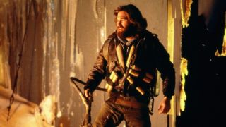 Kurt Russell setting a fire during one of the best sci-fi movies of all time, The Thing.