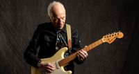 A portrait of the great Robin Trower with his Fender Stratocaster