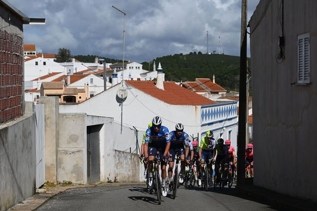 ALTODAFOIA PORTUGAL FEBRUARY 15 LR Warre Vangheluwe of Belgium and Mattia Cattaneo of Italy and Team Soudal Quick Step leads the peloton during the 50th Volta ao Algarve em Bicicleta 2024 Stage 2 a 1719km stage from Lagoa to Alto da Foia 888m on February 15 2024 in Alto da Foia Portugal Photo by Dario BelingheriGetty Images