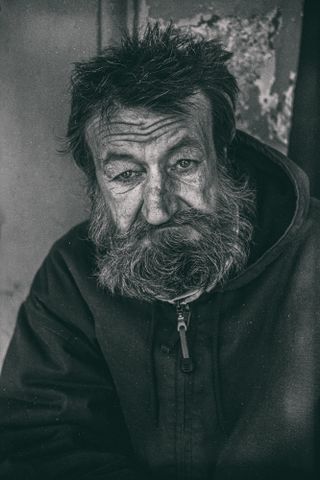 homeless man in italy street photography fujifilm