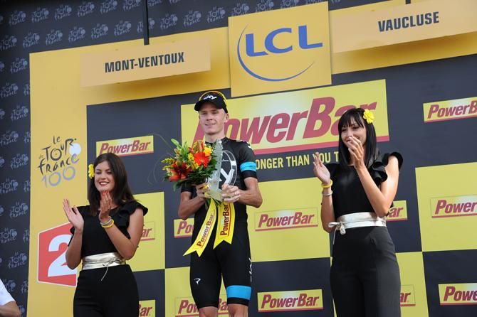 Chris Froome on the stage podium