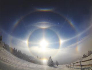 An image of a photometeor halo included in the new International Cloud Atlas. Halos are caused by light reflecting or refracting off tiny ice crystals suspended in the atmosphere, according to the Atlas.