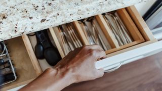 Open drawer with utensils