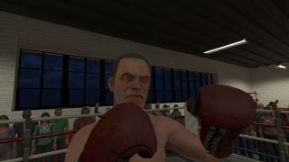 Man boxing in boxing ring