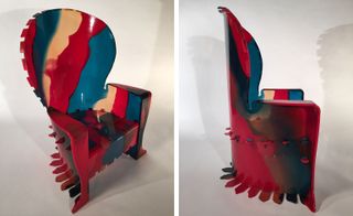 A prototype of a resin chair that mixes red, blue and white together