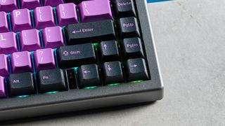 A black and purple Epomaker EK68 wireless mechanical keyboard