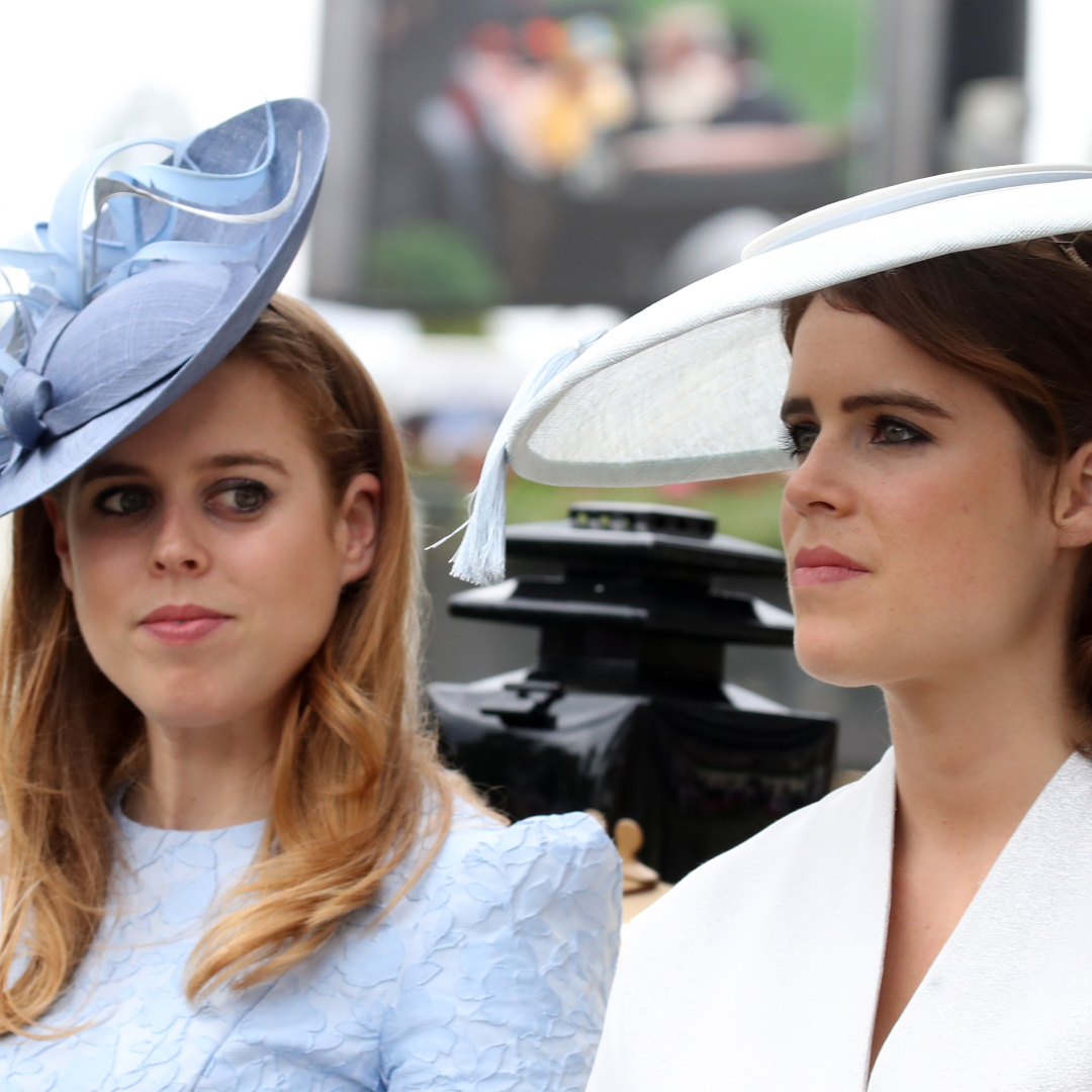 Princess Beatrice wears a baby blue hat and dress and sister Princess Eugenie wears a white hat and matching jacket