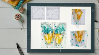 A photo of one of the best Cricut Brightpad alternatives on a table