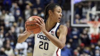 UConn&#039;s Olivia Nelson-Ododa holds the basketball during a game