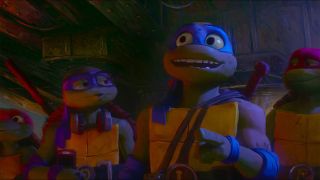 A screenshot of the four turtles smiling in Teenage Mutant Ninja Turtles: Mutant Mayhem