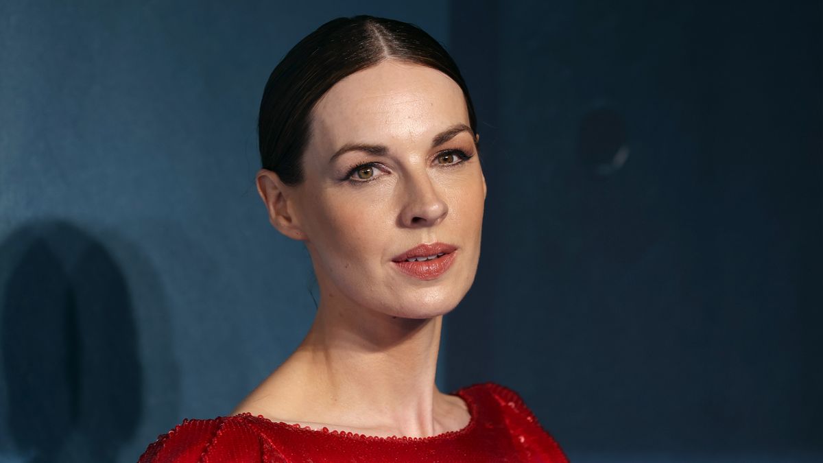 Close up of Jessica Raine in a red gown for The Devil's Hour global premiere on October 25 in London.