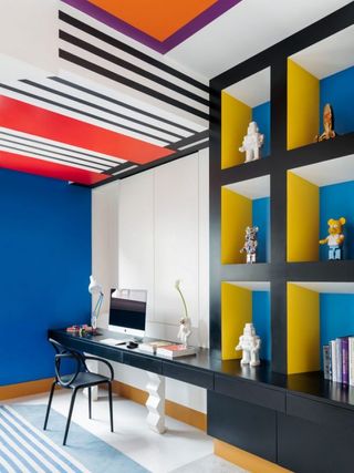 custom built in toy storage with bold colour palette