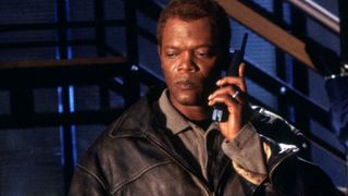 Samuel L. Jackson holds the phone in the action film The Negotiator