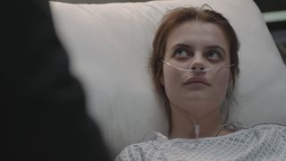 Effie in an ED hospital bed looking dangerously ill