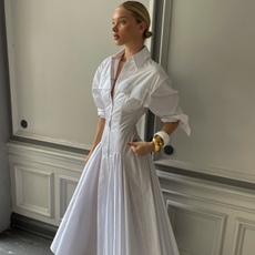 Elsa Hosk wearing a white fit-and-flare shirt dress