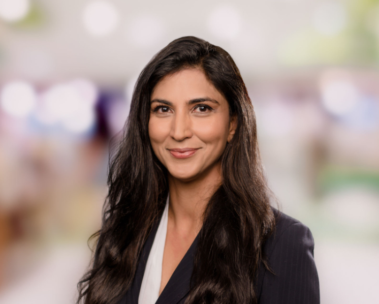 A headshot of Dr Sasha Dhoat, consultant dermatologist